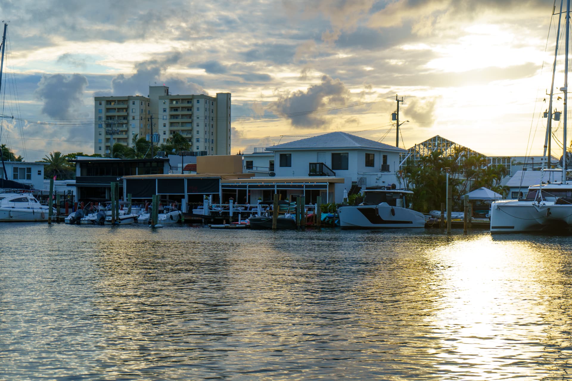 Serafina's waterfront patio and docks on the Middle River at sunset